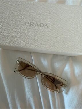 Prada Women’s Clear Frame Sunglasses with Brown Lenses